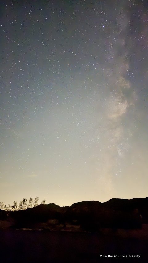 Milky Way above a dark horizon, photographed by Mike Basso